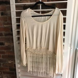 Light and free off white fringe top